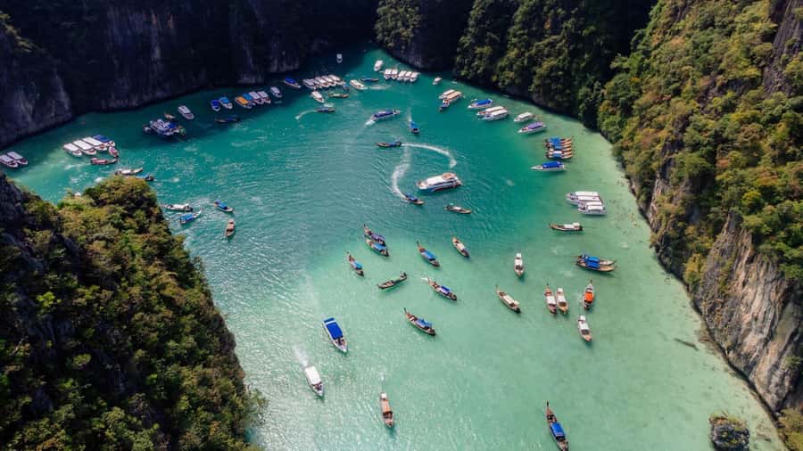 Krabi: Phi Phi Early Bird & 4 Island by Speedboat with Lunch - Pickup, breakfast box, and what that speedboat ride feels like